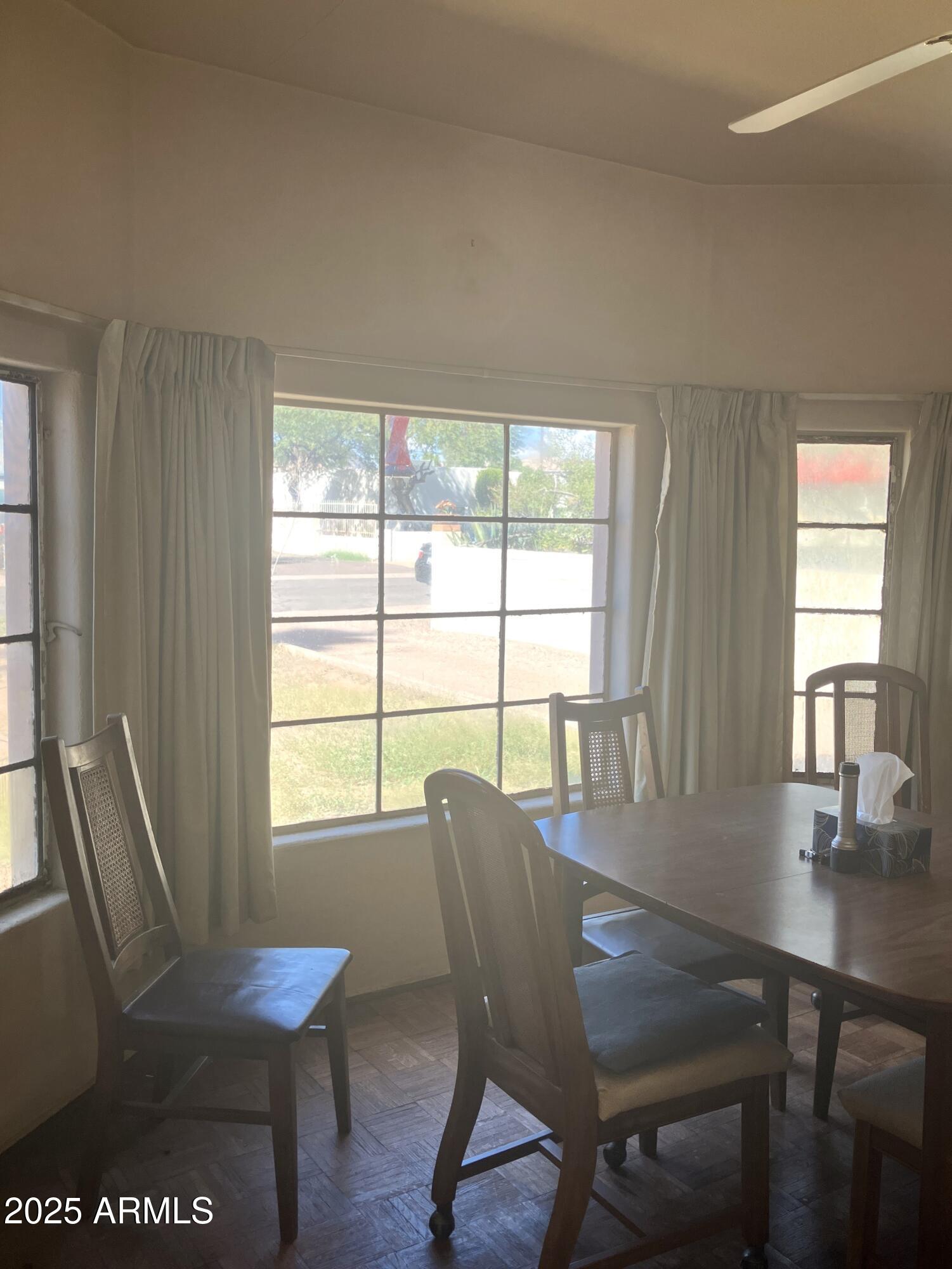 1637 East Roma Avenue Phoenix, AZ 85016 - Photo 21 of 78 a view of a dining room with furniture window and outside view