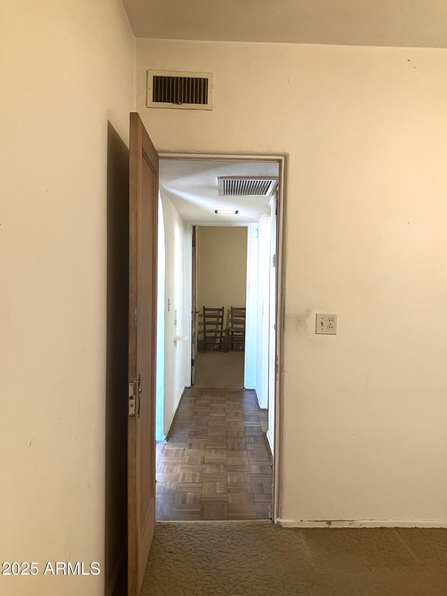 1637 East Roma Avenue Phoenix, AZ 85016 - Photo 33 of 78 a view of a hallway with wooden floor