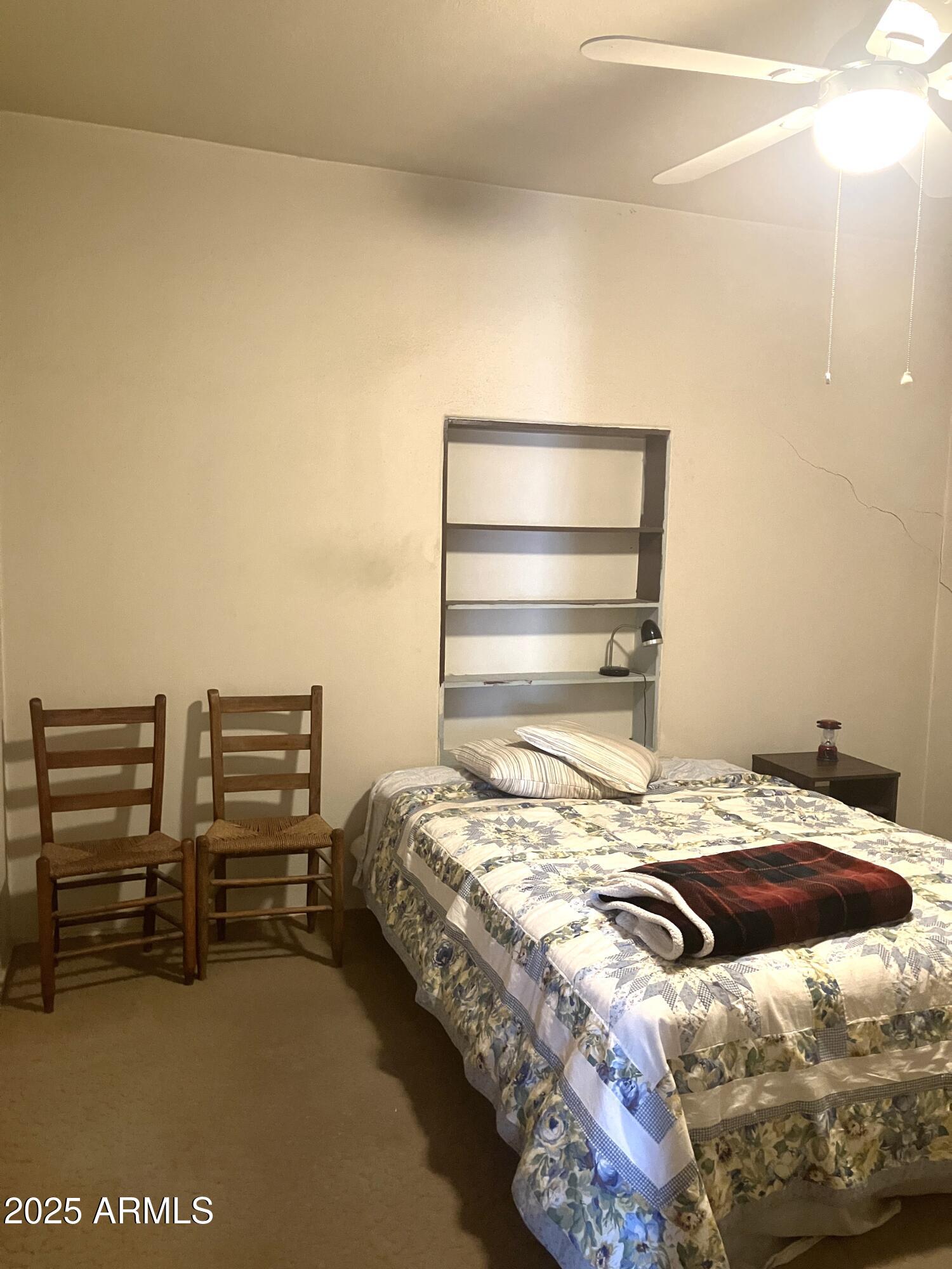 1637 East Roma Avenue Phoenix, AZ 85016 - Photo 36 of 78 a bedroom with a bed and a cabinets