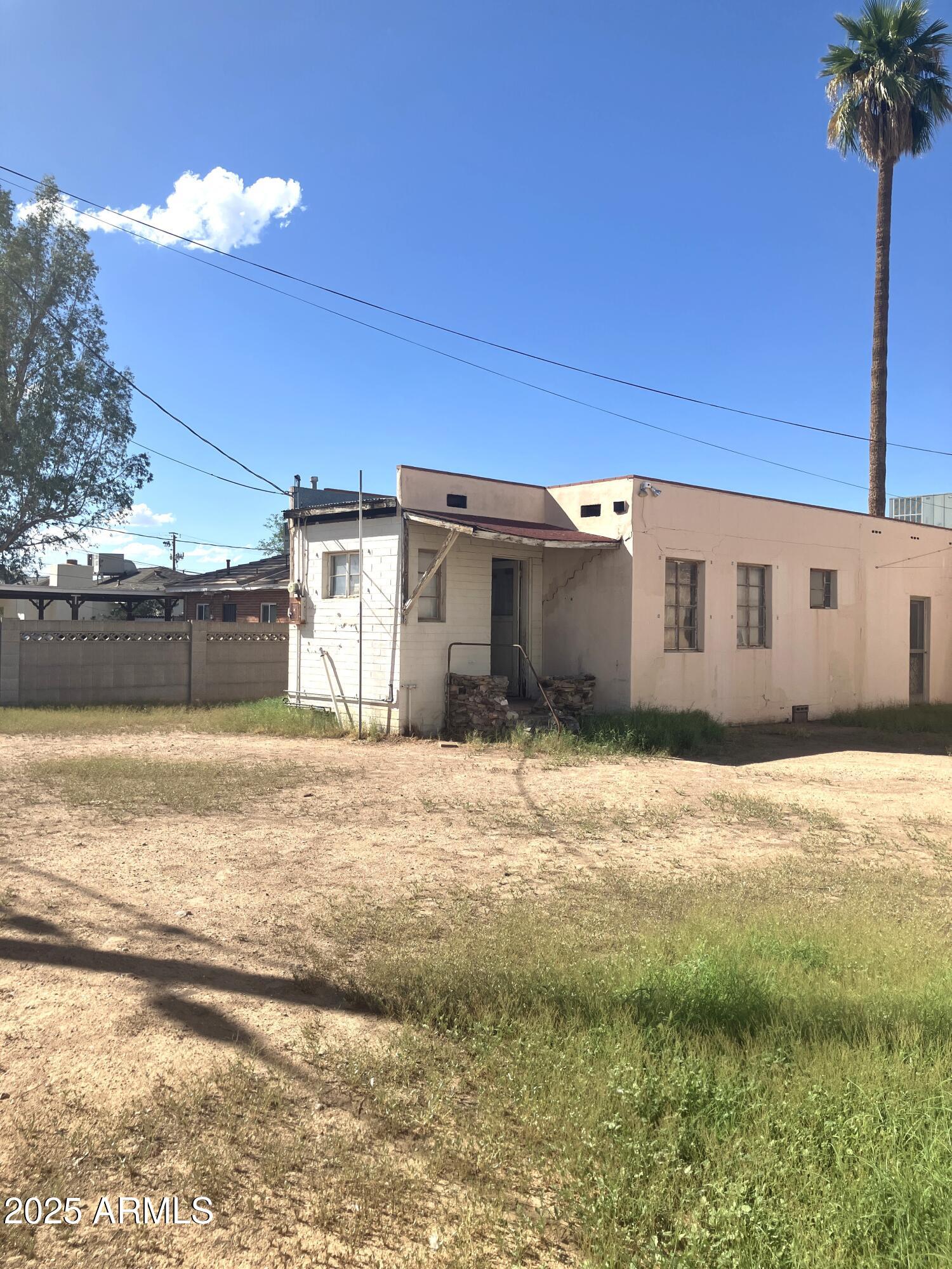 1637 East Roma Avenue Phoenix, AZ 85016 - Photo 50 of 78 a view of a house with a yard