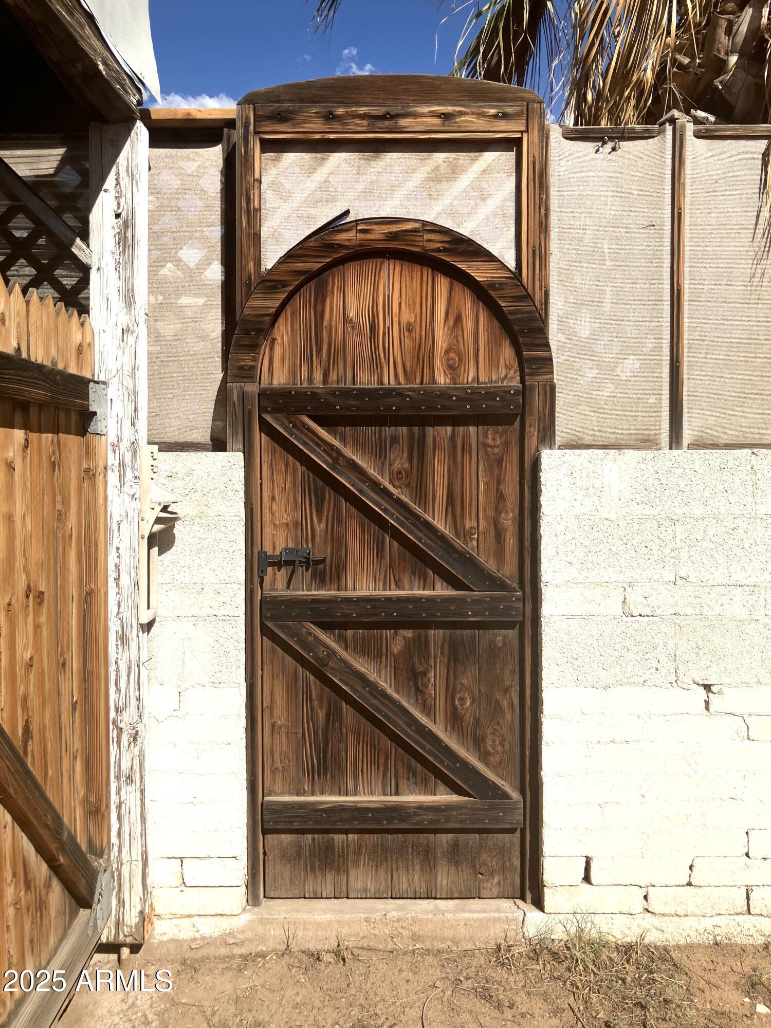 1637 East Roma Avenue Phoenix, AZ 85016 - Photo 60 of 78 Decorative Wood Door off Driveway