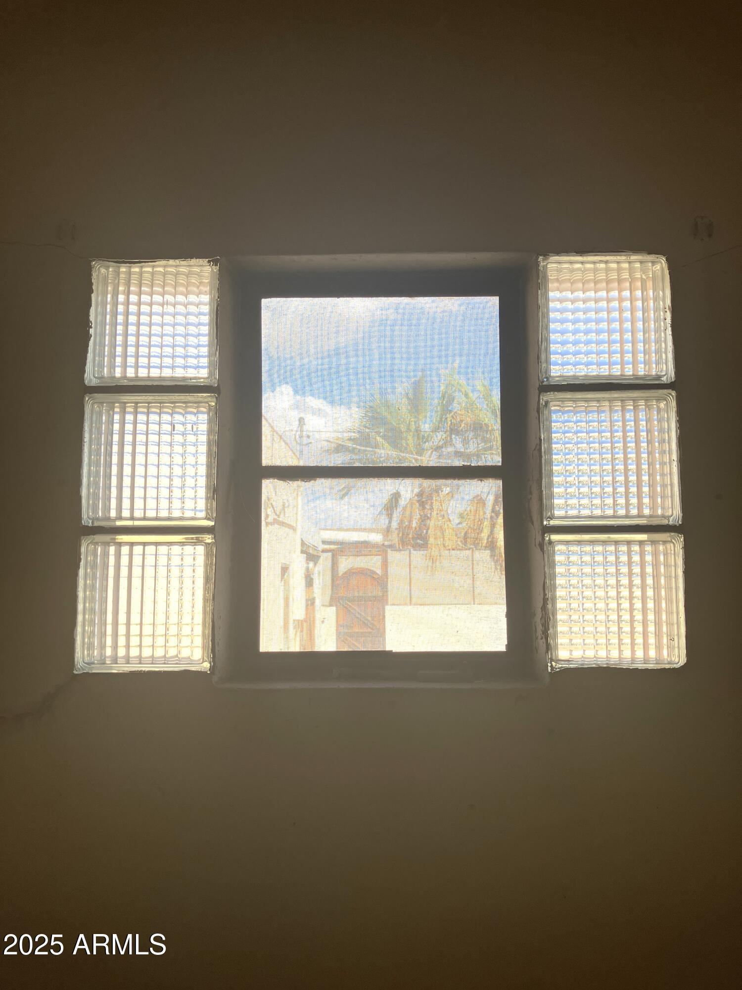 1637 East Roma Avenue Phoenix, AZ 85016 - Photo 74 of 78 a view of an empty room with a window