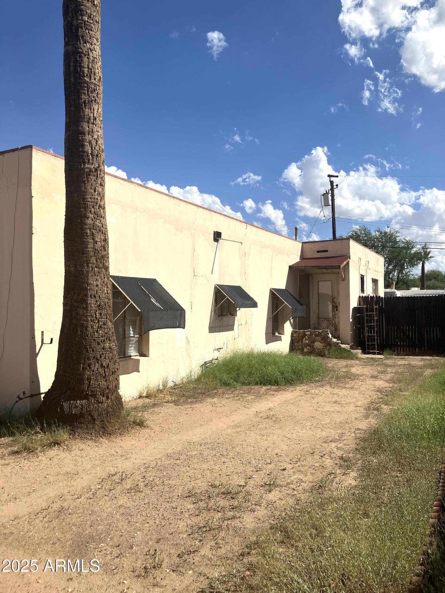 1637 East Roma Avenue Phoenix, AZ 85016 - Photo 7 of 78 a front view of a house with a yard and garage