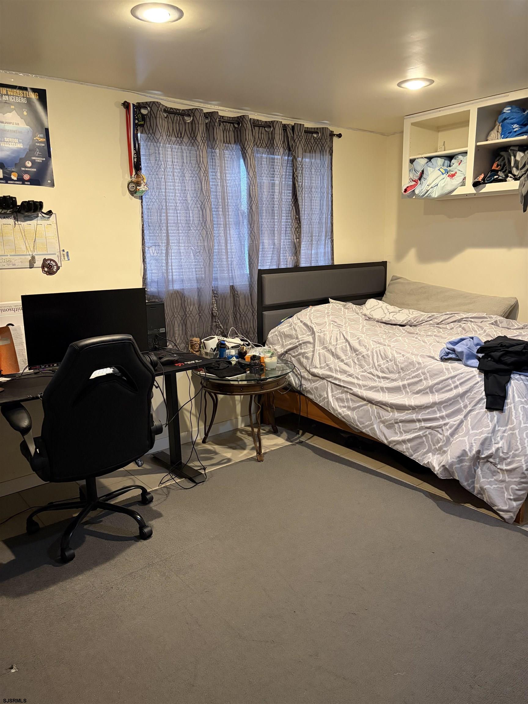 155 Chestnut Street Woodbine, NJ 08270 - Photo 12 of 18 a bedroom with a bed a desk and chair