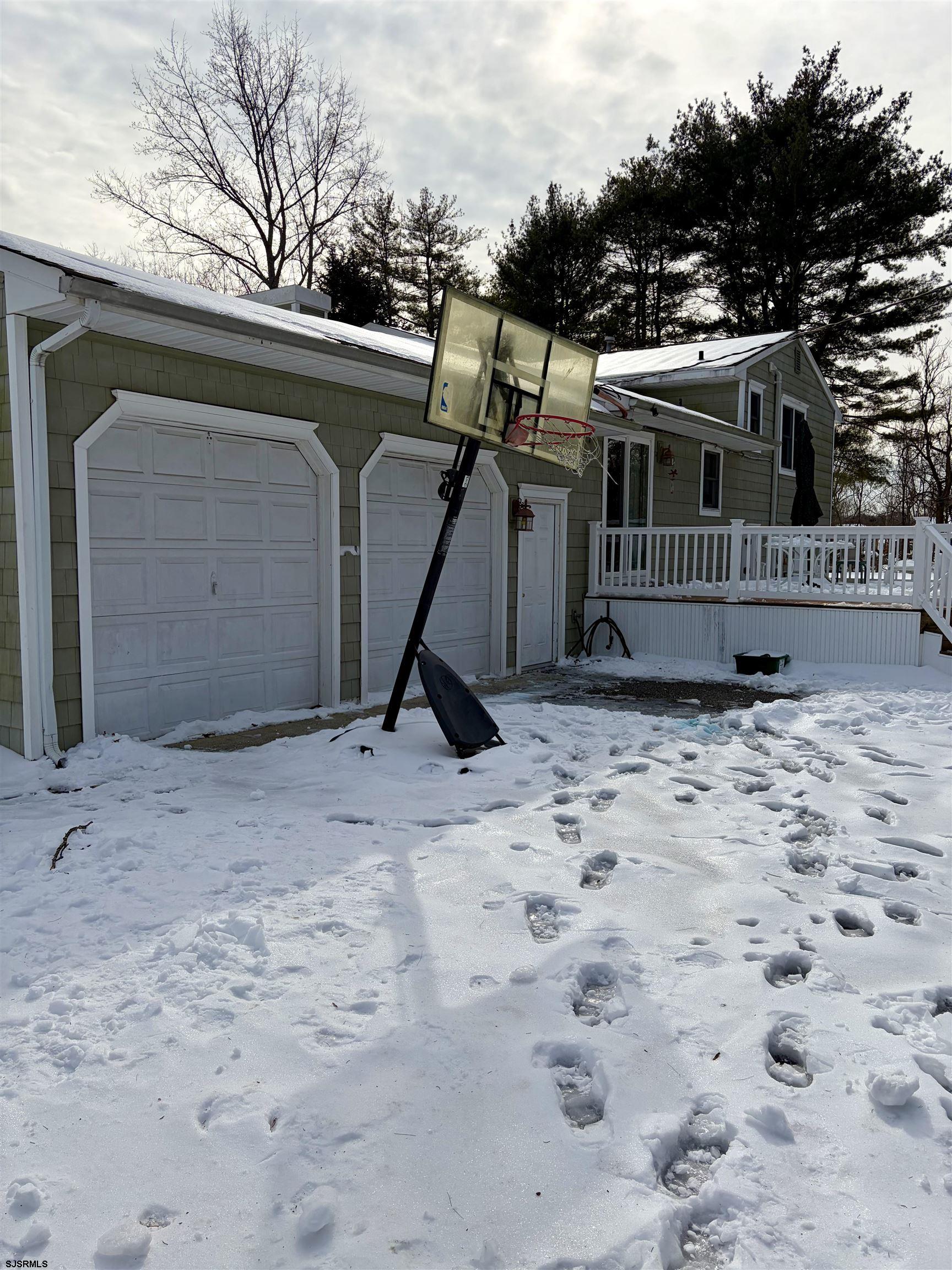 155 Chestnut Street Woodbine, NJ 08270 - Photo 5 of 18 a view of a small yard in front of a house