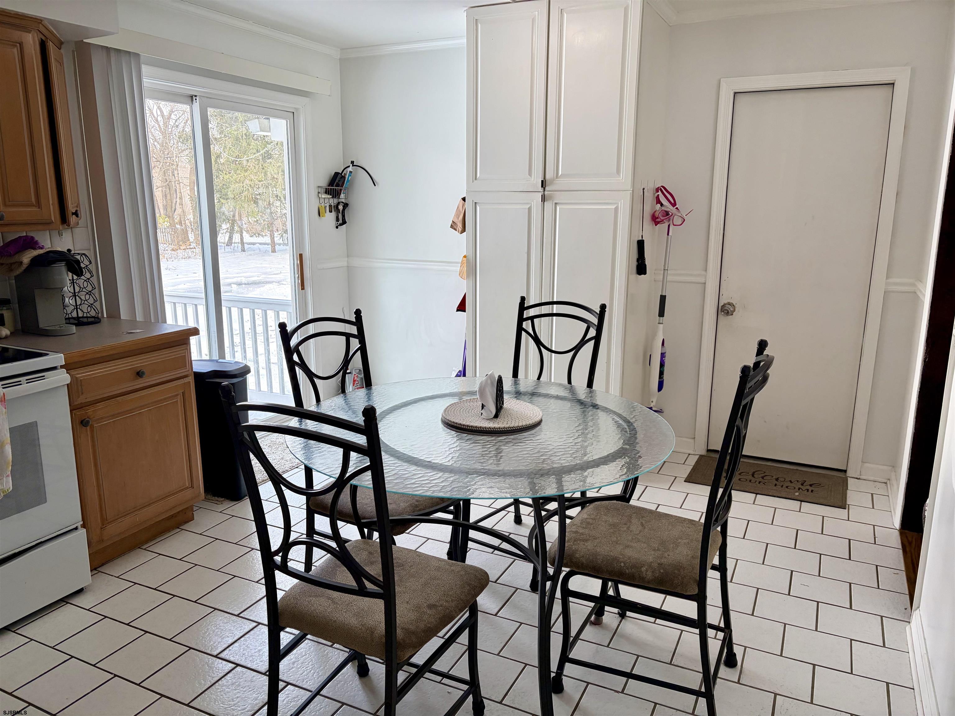 155 Chestnut Street Woodbine, NJ 08270 - Photo 8 of 18 a view of a dining room with furniture and window