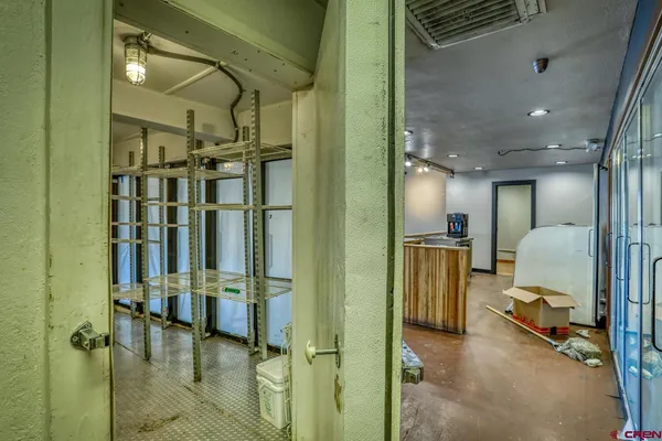 a view of a bathroom with a shower curtain