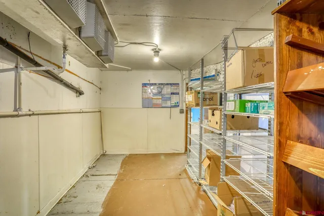 a bathroom with a sink vanity granite and a mirror