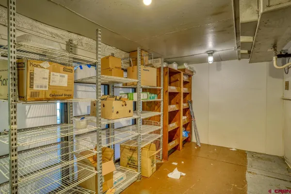 a bathroom with a sink mirror vanity and toilet