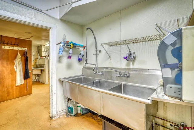 a bathroom with a sink and a shower