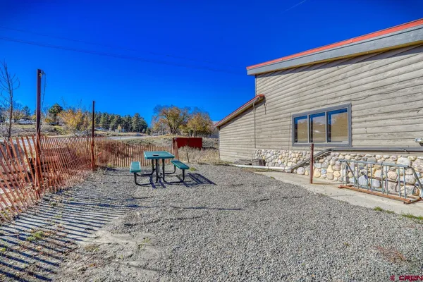 a balcony with outdoor seating
