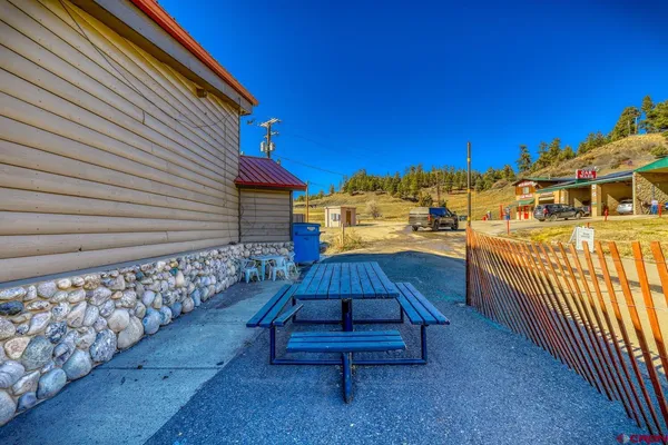 a view of parking with cars parked