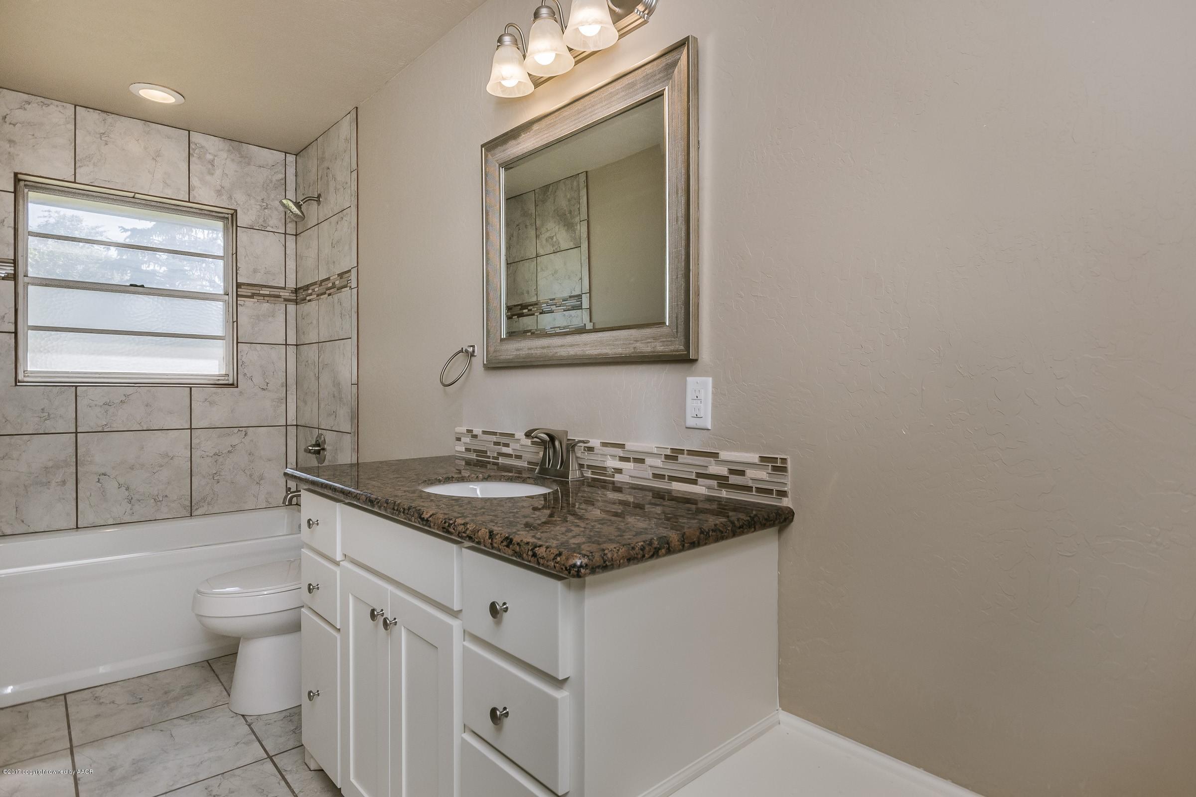 4232 Arden Road Amarillo, TX 79110 - Photo 19 of 25 020_Hall Bathroom_