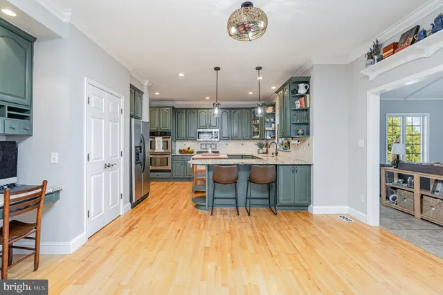 a view of a hallway with washer and dryer