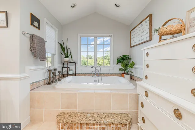 a view of a house with swimming pool and yard