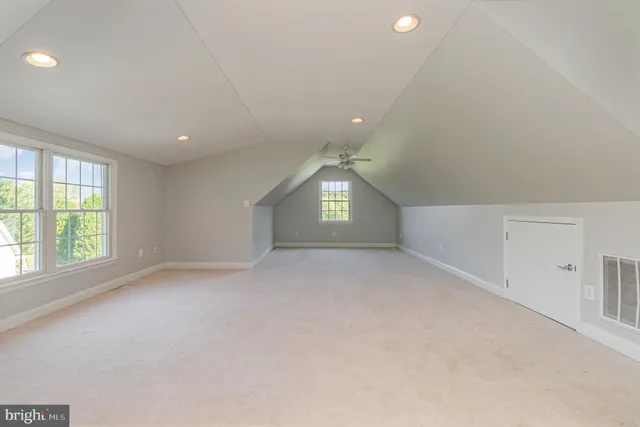 an aerial view of a house with a garden