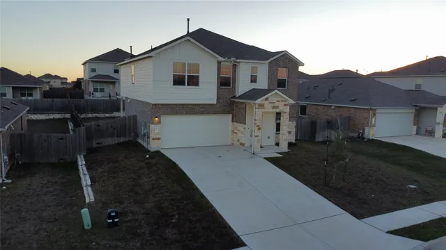 a bathroom with a sink vanity and mirror