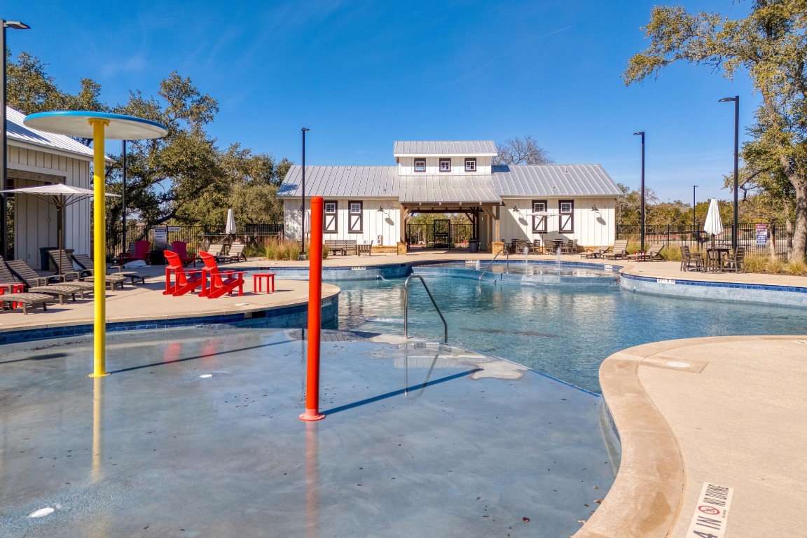 1113 Dog Iron Street Georgetown, TX 78633 - Photo 30 of 33 a view of a swimming pool with a patio