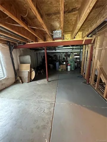 a kitchen with stainless steel appliances granite countertop a sink and a stove