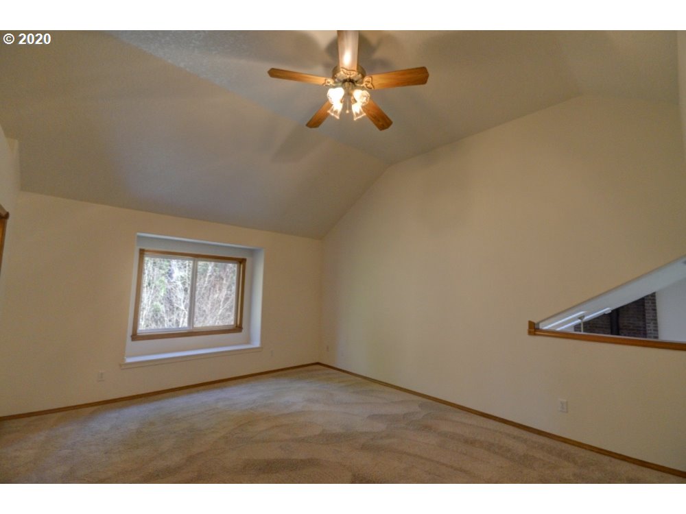 67051 East Barlow Trail Road Rhododendron, OR 97049 - Photo 14 of 32 a view of an empty room with a window