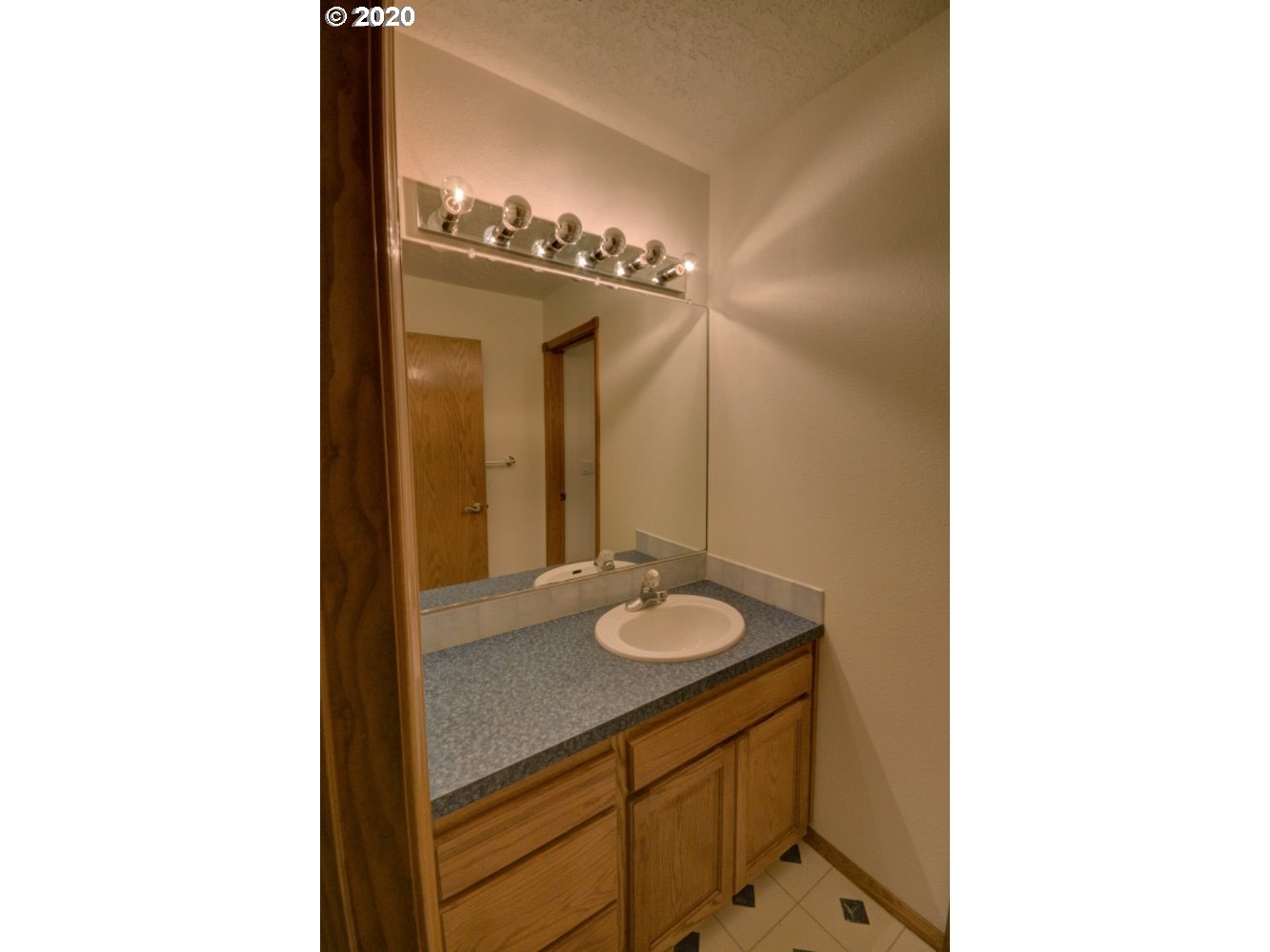 67051 East Barlow Trail Road Rhododendron, OR 97049 - Photo 20 of 32 a bathroom with a sink and a mirror