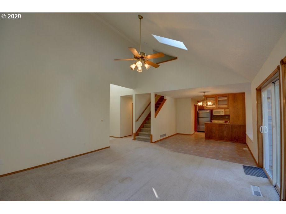 67051 East Barlow Trail Road Rhododendron, OR 97049 - Photo 6 of 32 a view of a room with a ceiling fan and a window