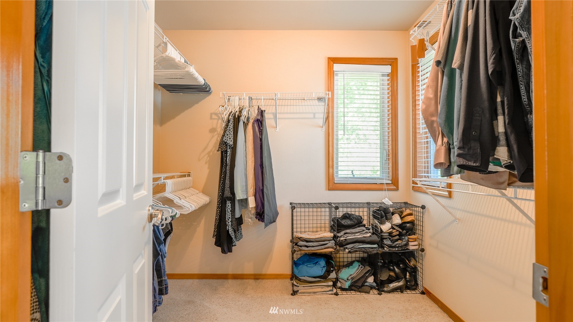 3101 Talbot Road South Renton, WA 98055 - Photo 23 of 30 a view of walk in closet with clothes and shoes