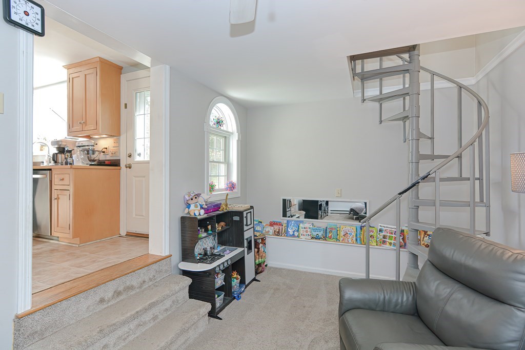 3 Orchard Place Douglas, MA 01516 - Photo 13 of 39 a living room with furniture and a wooden floor