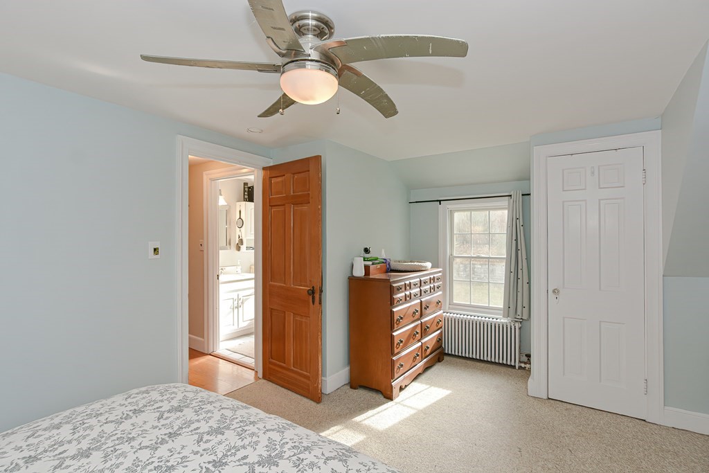 3 Orchard Place Douglas, MA 01516 - Photo 17 of 39 a view of a bedroom with closet and windows