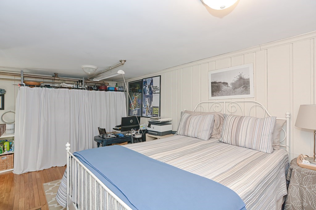 3 Orchard Place Douglas, MA 01516 - Photo 24 of 39 a bedroom with a bed and a dresser