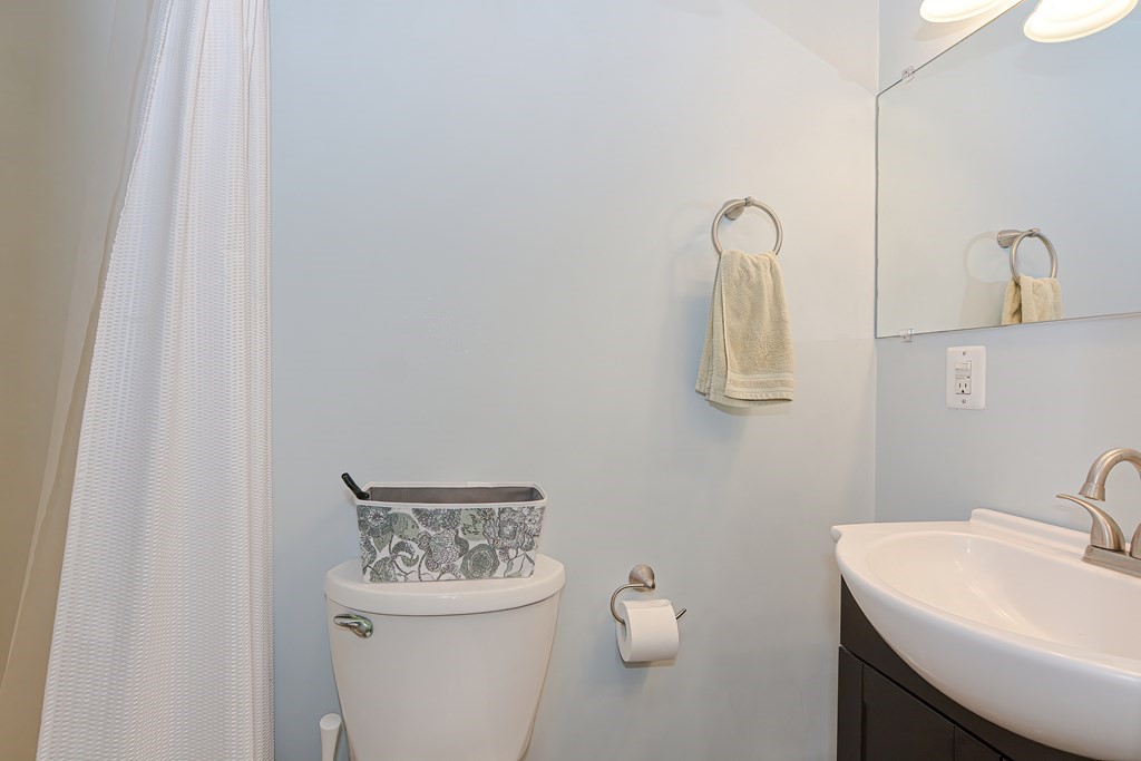 3 Orchard Place Douglas, MA 01516 - Photo 30 of 39 a bathroom with a toilet sink and mirror