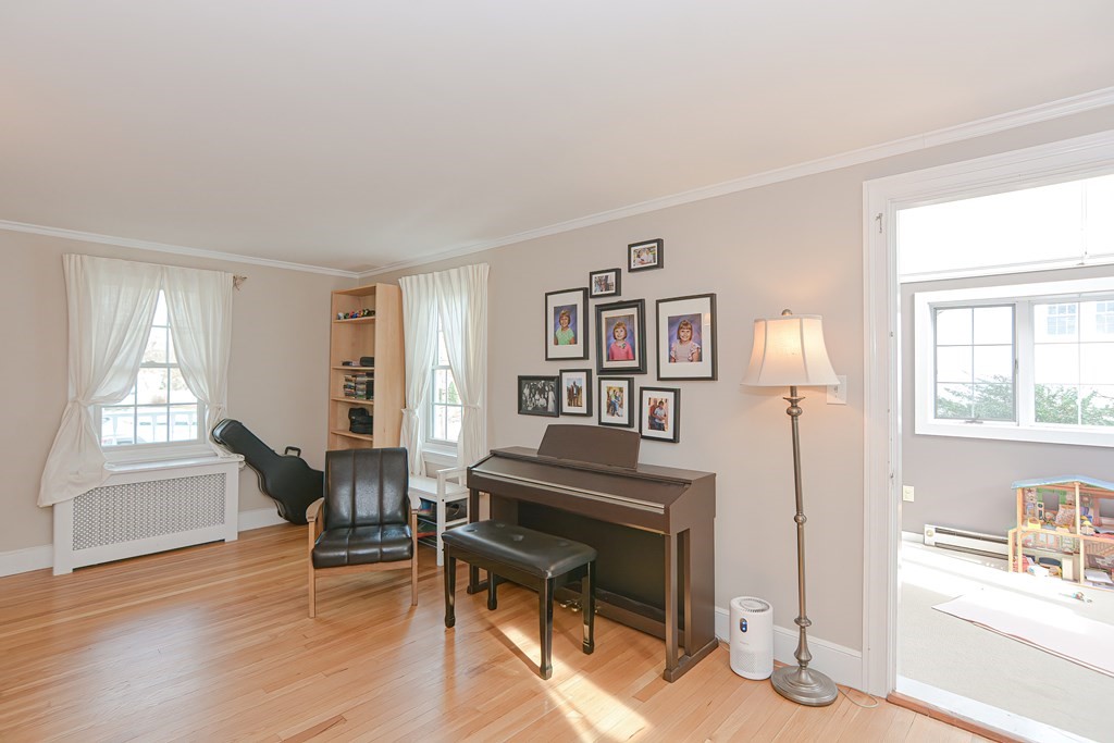 3 Orchard Place Douglas, MA 01516 - Photo 32 of 39 a living room with furniture and a wooden floor