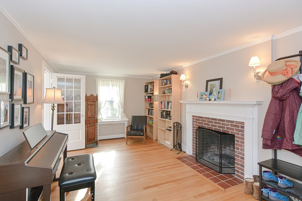 3 Orchard Place Douglas, MA 01516 - Photo 33 of 39 a living room with furniture and a fireplace