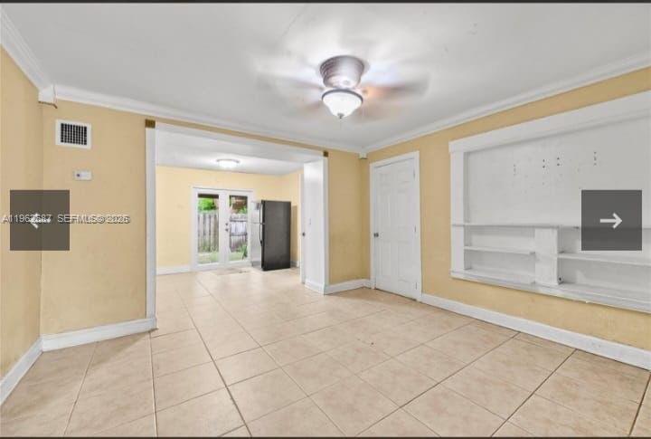 1835 Northwest 85th Street Miami, FL 33147 - Photo 12 of 19 a view of a livingroom with a chandelier