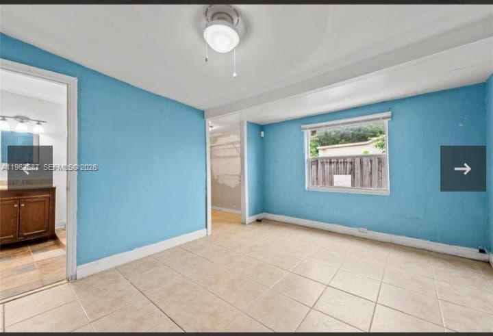 1835 Northwest 85th Street Miami, FL 33147 - Photo 10 of 19 an empty room with windows