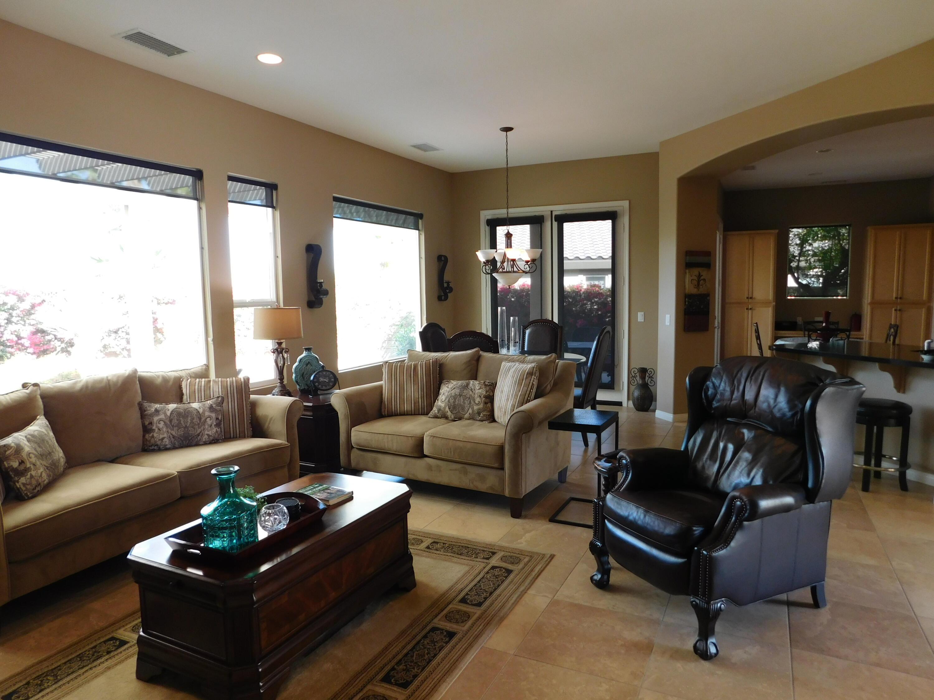81278 Golden Barrel Way La Quinta, CA 92253 - Photo 17 of 17 a living room with furniture and a large window
