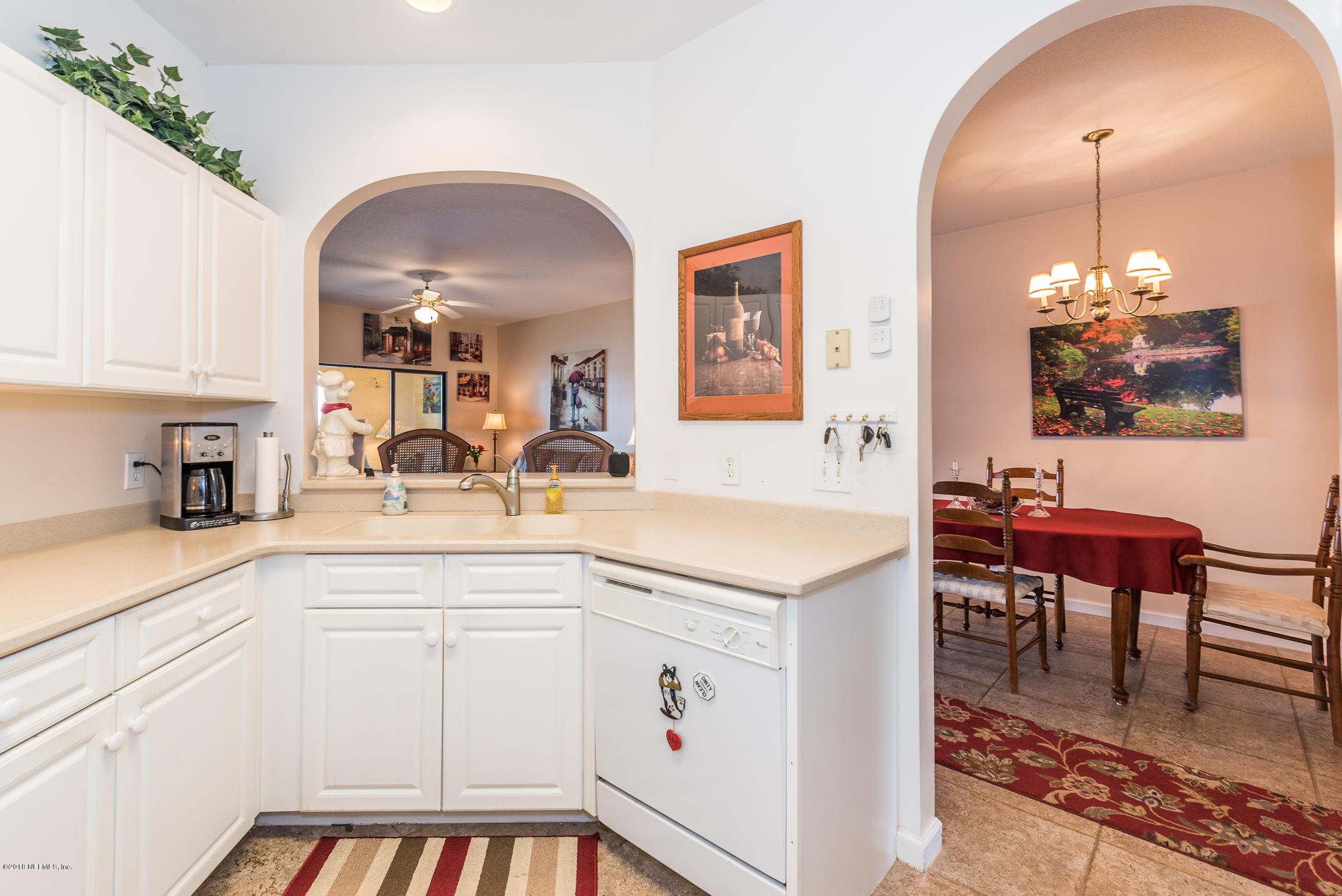 3427 Haley Pointe Road St. Augustine, FL 32084 - Photo 21 of 50 a view of a kitchen area and dining room