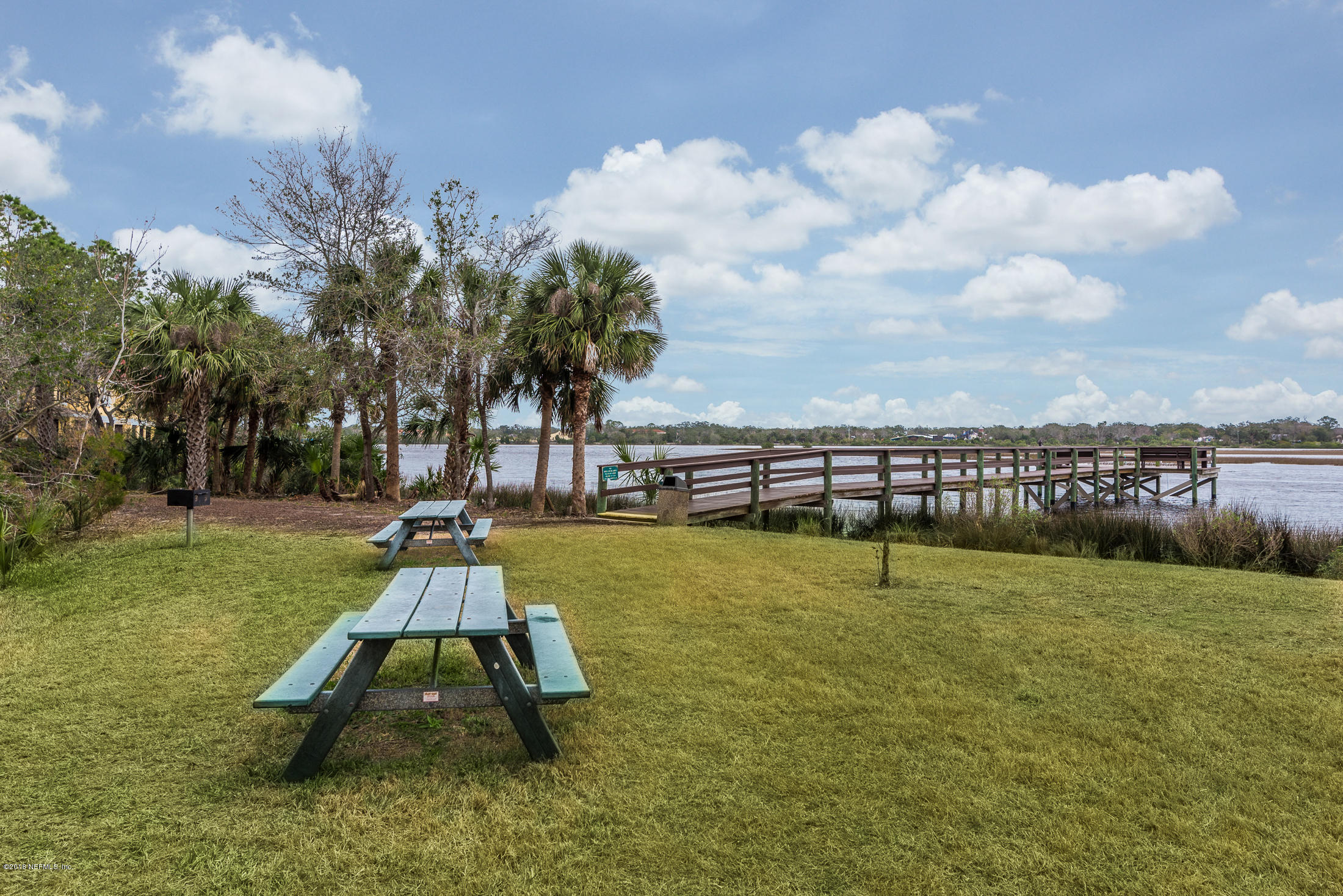3427 Haley Pointe Road St. Augustine, FL 32084 - Photo 35 of 50 a swimming pool with wooden fence