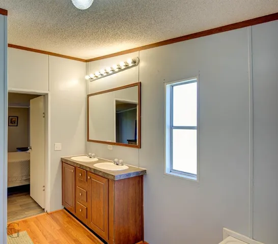 a view of room with window and furniture