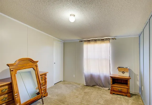 a view of a room with an empty space