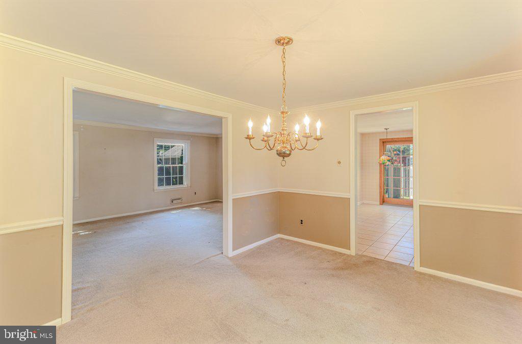 324 Wayland Road Cherry Hill, NJ 08034 - Photo 10 of 28 a view of a chandelier in an empty room
