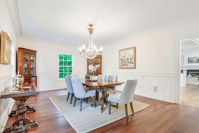 16 Normandy Lane Riverside, CT 06878 - Photo 12 of 43 a view of a dining room with furniture window and wooden floor