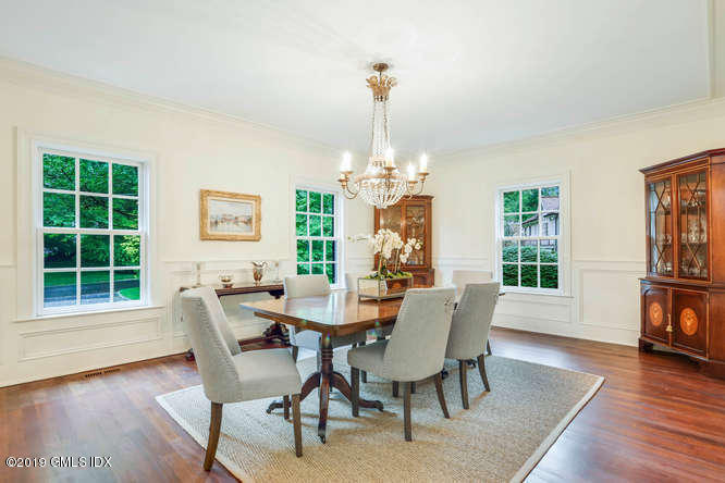 16 Normandy Lane Riverside, CT 06878 - Photo 13 of 43 a view of a dining room with furniture window and wooden floor