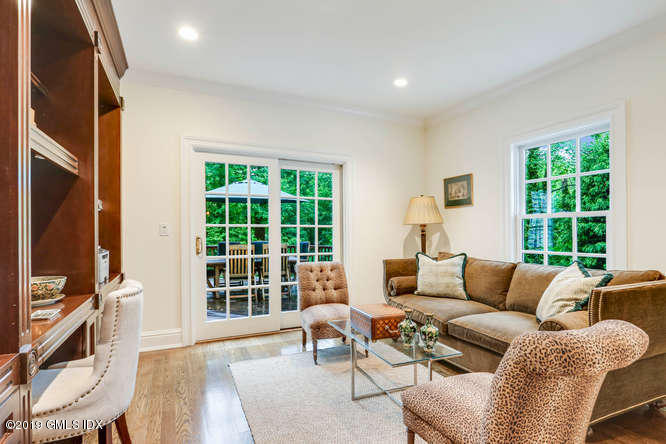 16 Normandy Lane Riverside, CT 06878 - Photo 14 of 43 a living room with furniture and a flat screen tv
