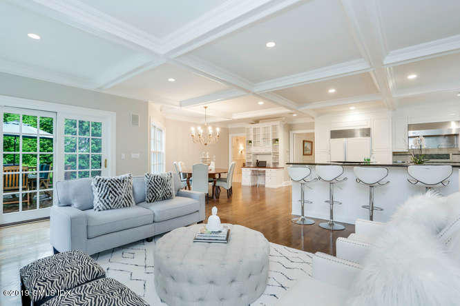 16 Normandy Lane Riverside, CT 06878 - Photo 18 of 43 a living room with furniture and a large window