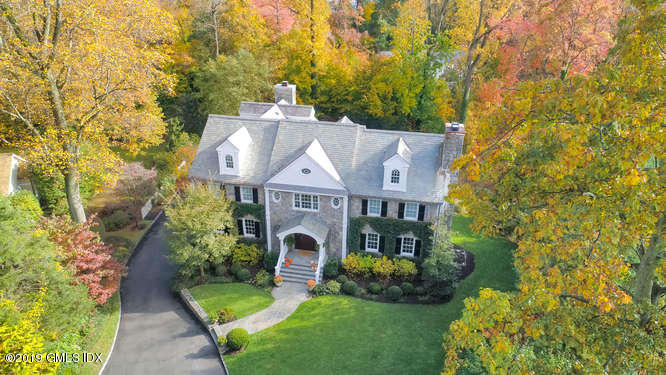 16 Normandy Lane Riverside, CT 06878 - Photo 2 of 43 front view of a house with a yard