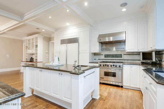 16 Normandy Lane Riverside, CT 06878 - Photo 23 of 43 a kitchen with stainless steel appliances granite countertop a stove and a sink