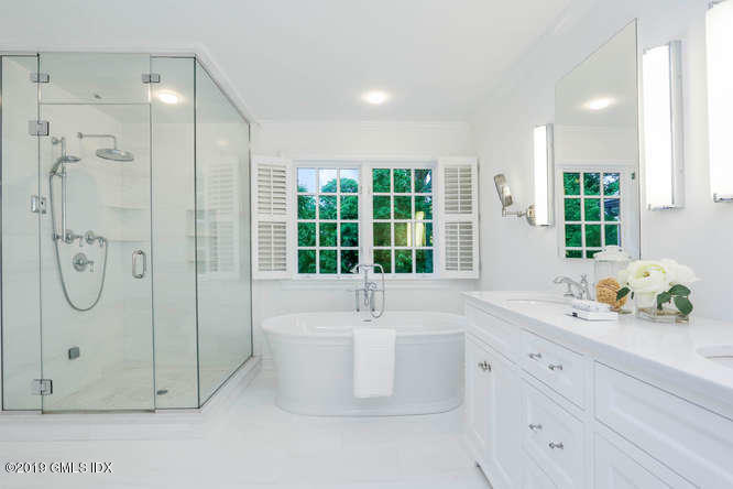 16 Normandy Lane Riverside, CT 06878 - Photo 28 of 43 a bathroom with a tub sink and mirror