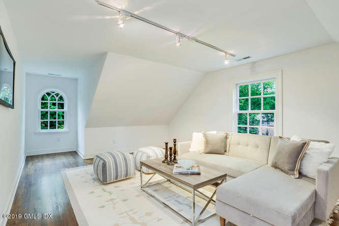 16 Normandy Lane Riverside, CT 06878 - Photo 34 of 43 a living room with furniture and a window