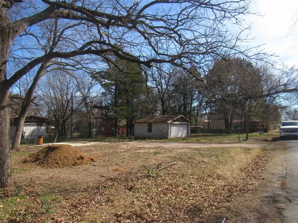 a house with trees in front of it